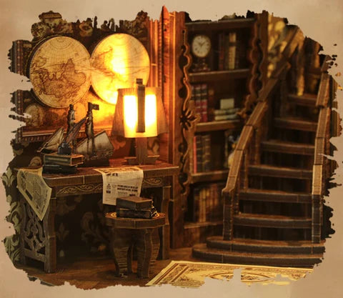 Mapas y escalera de libros