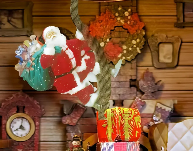 Papá Noel cargado de regalos